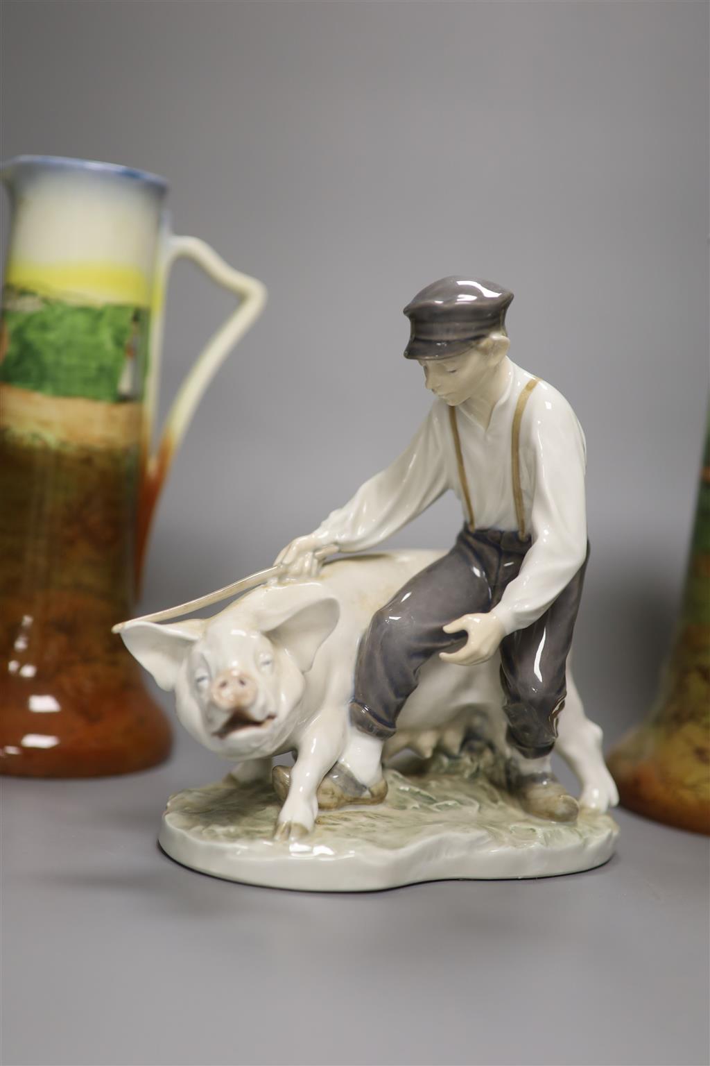 A pair of Royal Doulton Seriesware jugs, a Doulton figure, Little Boy Blue and Worcester figure, Joan and Royal Copenhagen figure of fa
